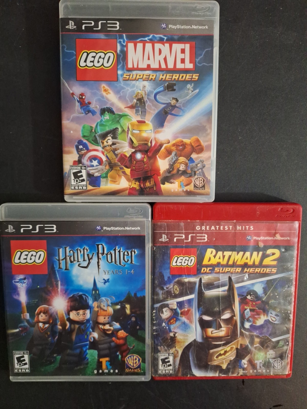 Lego Marvel Super Heroes, Harry Potter Years 1-4, & Batman 2 (PS3) 3 Game Bundle