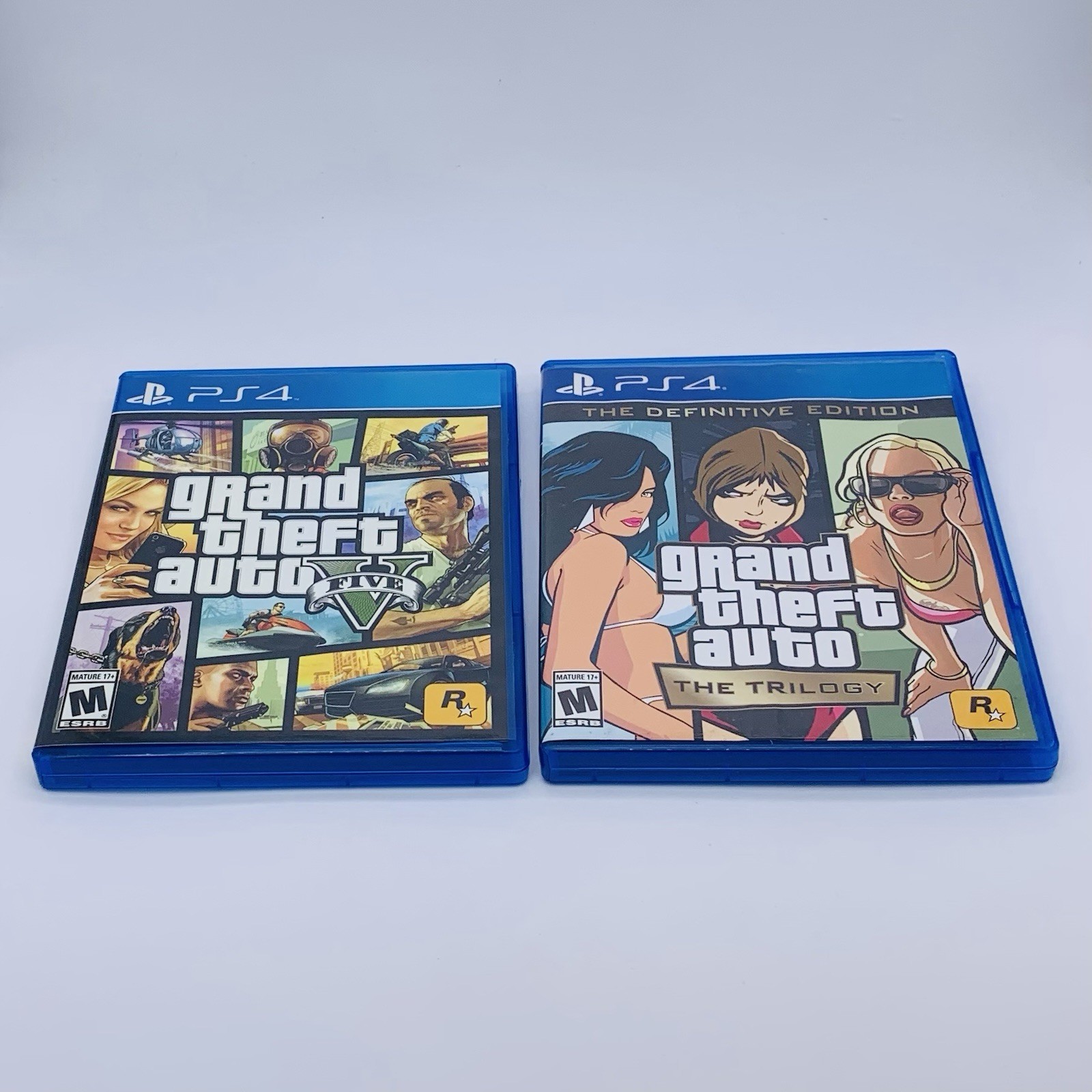 Lot of 2 Grand Theft Auto V 5 & The Trilogy The Definitive Edition PS4 – Tested