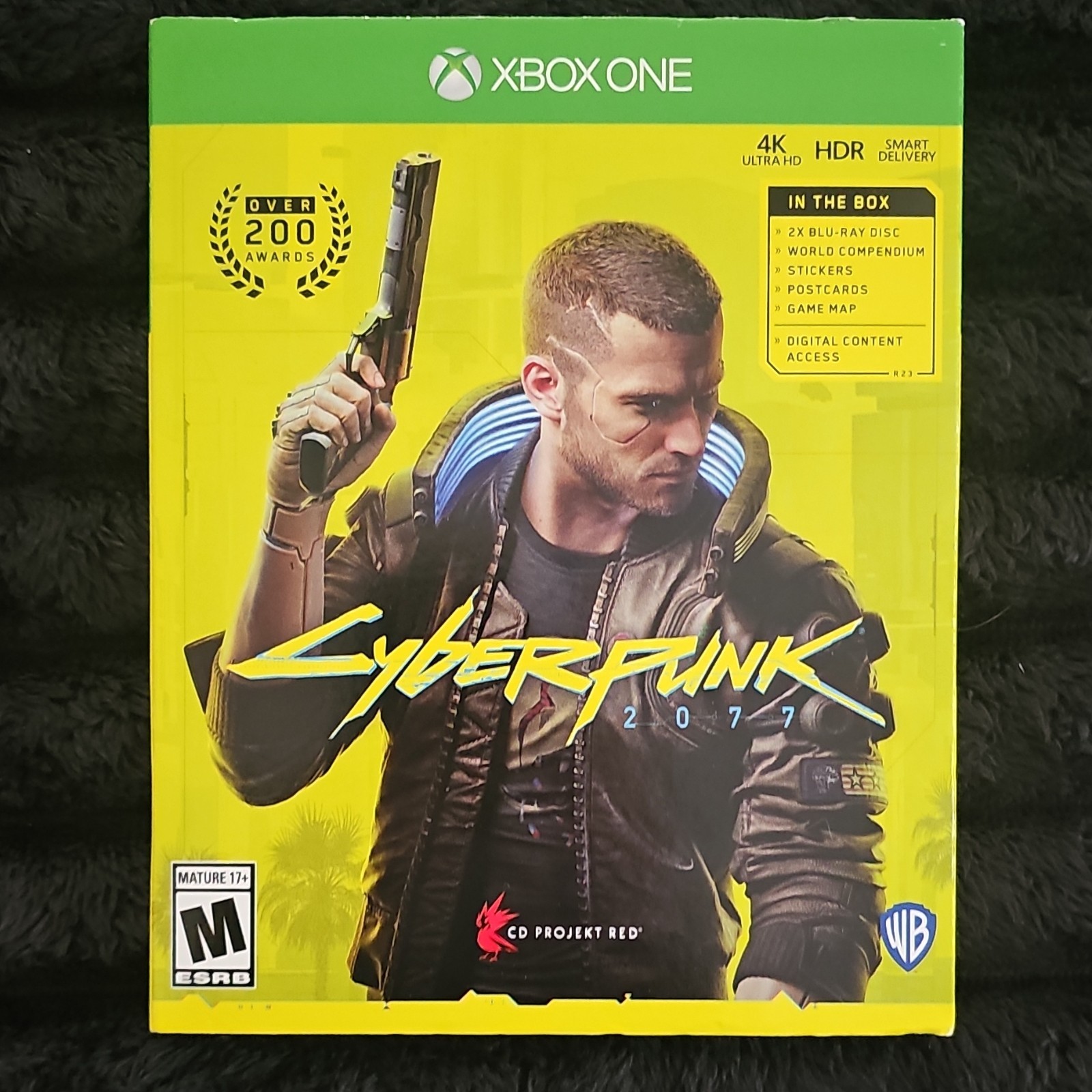 Cyberpunk 2077 (Xbox One) with World Compendium, Stickers, Post Cards, World Map