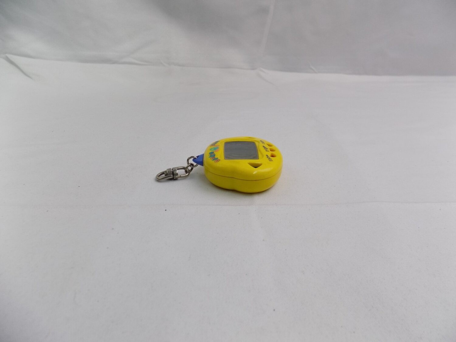 Dinkie Dino Virtual Pet Keychain RakuRaku