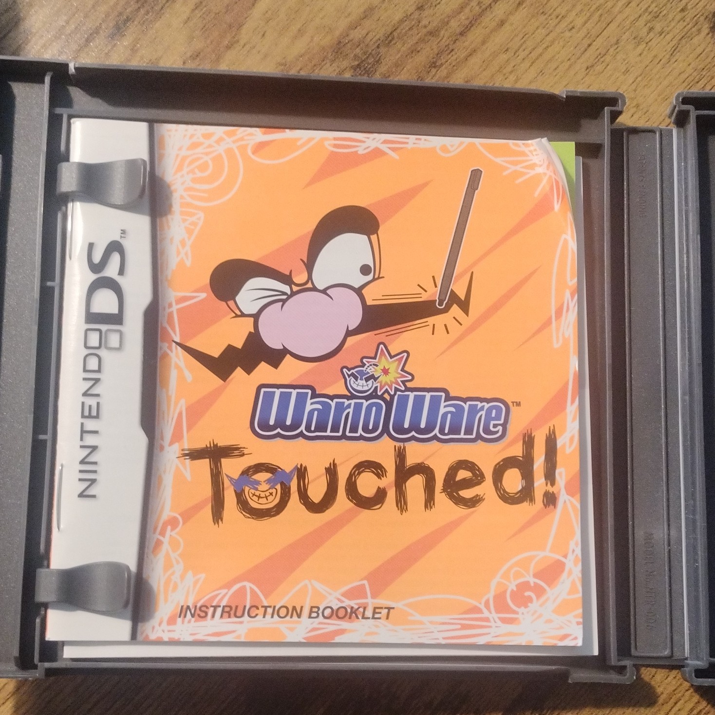 Nintendo WarioWare: Touched! Nintendo DS (E) NTSC-U/C 2005 Manual Included