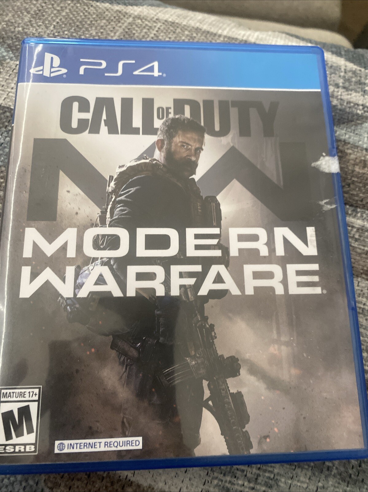 Call of Duty: Modern Warfare – Sony PlayStation 4 with labels‘ residue