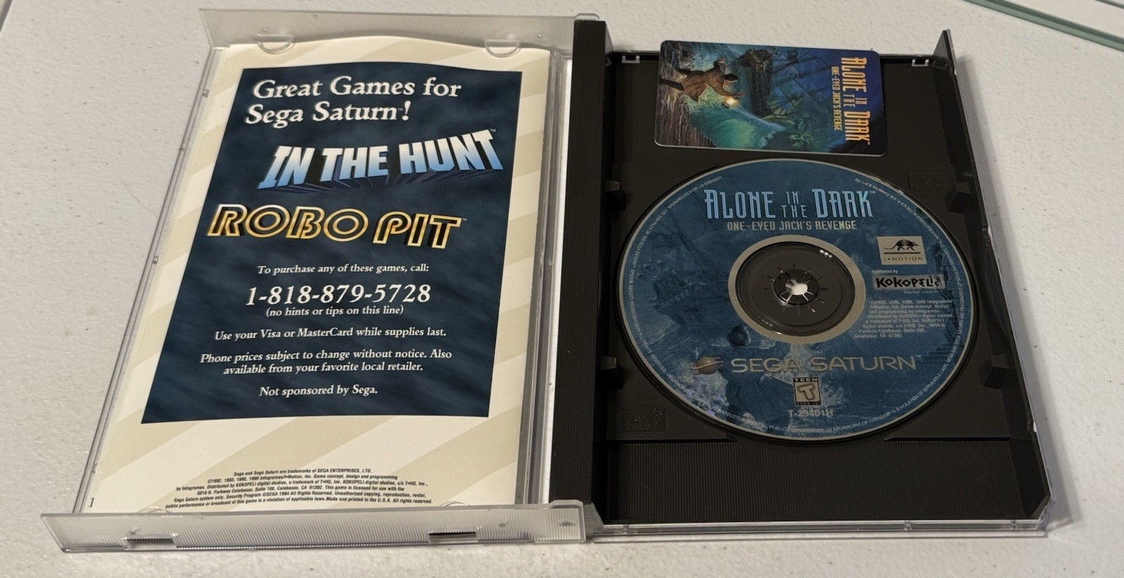 Alone in the Dark: One-Eyed Jack’s Revenge w/Reg Card & Phone Card- Sega Saturn