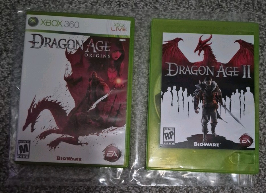 DRAGON AGE: 4-PIECE SET- (DRAGON AGE- ORIGINS & DRAGON AGE 2- ( Games & Guides)